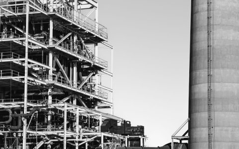 Black and white image of a factory structure in San Francisco, showcasing industrial design.