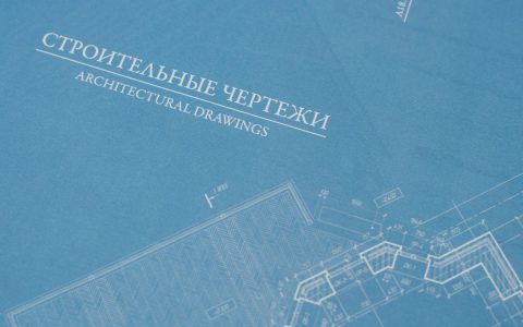 Close-up of detailed blueprints highlighting architectural design elements.