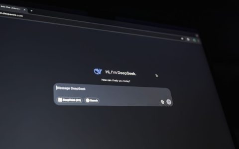 A dark-themed chat interface displaying an AI assistant conversation starter on a screen.