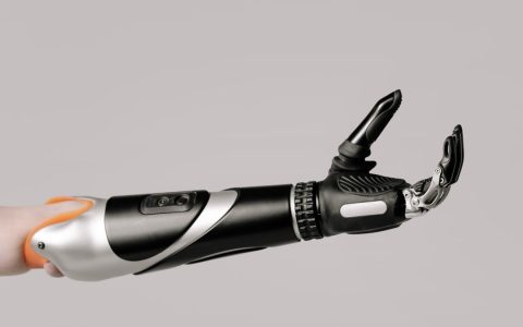 Close-up of a modern prosthetic arm displaying advanced technology and design.