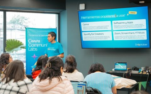 A speaker presenting technology tools in a workshop environment.